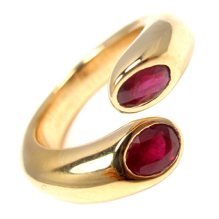 CARTIER ELLIPSE DEUX TETES CROISEES 18K YELLOW GOLD RUBY RING.