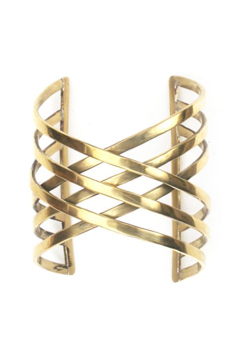 Fair trade cuff by Soko, handcrafted by artisans in Kenya from reclaimed brass. ...