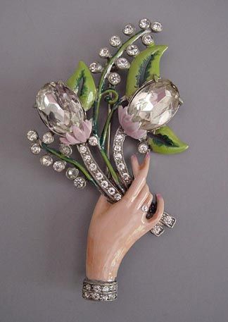 Staret hand holding flowers brooch 1940