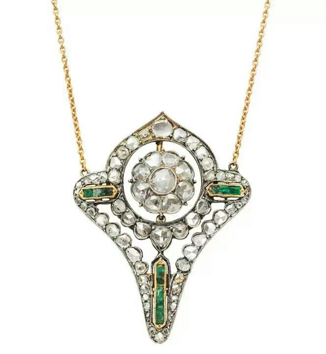Emerald, diamond and gold necklace.
