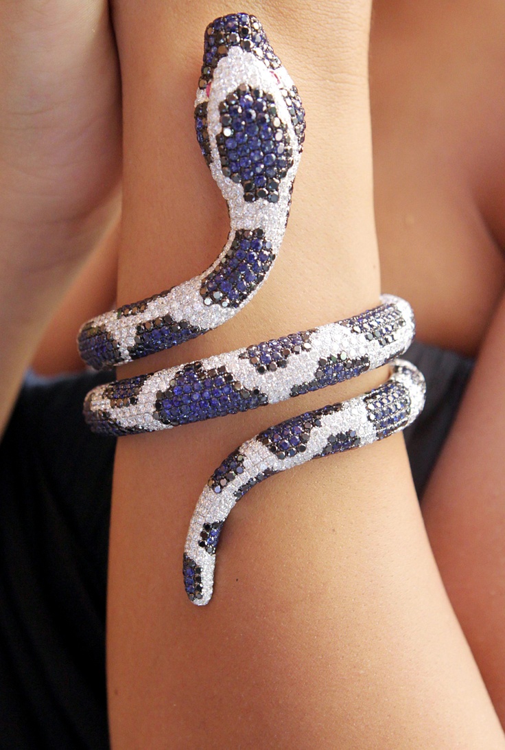A sapphire and diamond snake bracelet.