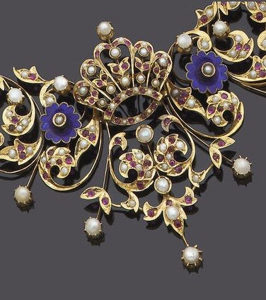 A late 19th century gold, ruby, seed pearl and enamel necklace, circa 1890. Desi...