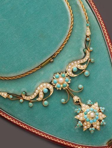 An early 20th century turquoise and half pearl necklace. Suspending a turquoise ...