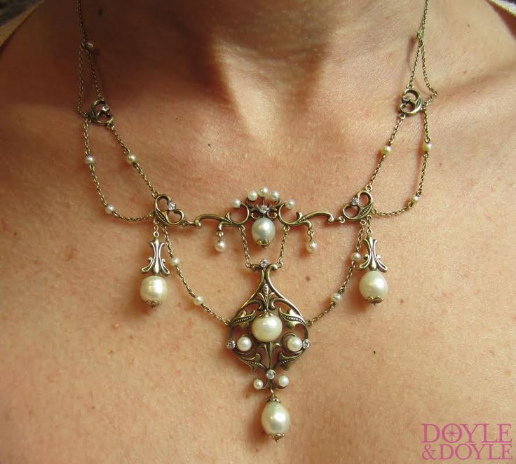 Antique natural pearl and Old European cut diamond festoon necklace in 14k gold....