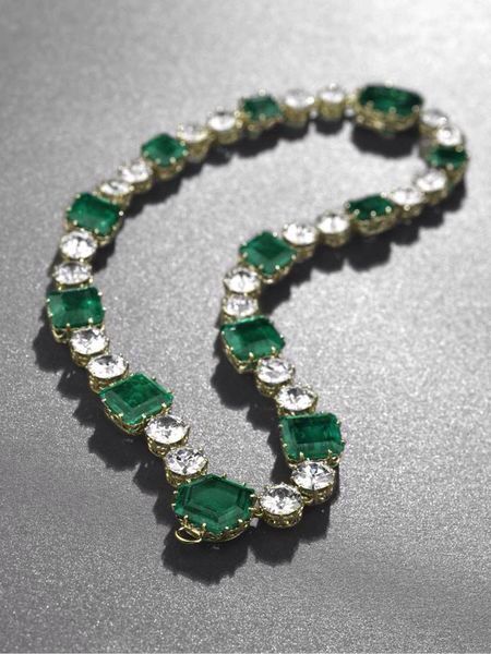 Emerald, diamond and gold necklace.