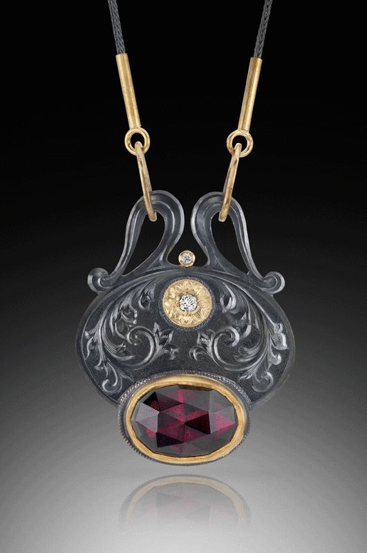 Garnet, diamond, silver and gold engraved pendant on a silver chain, by David Gi...