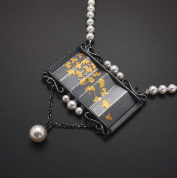 Ginkgo and pearl necklace.  The black is oxidized sterling with find gold attach...