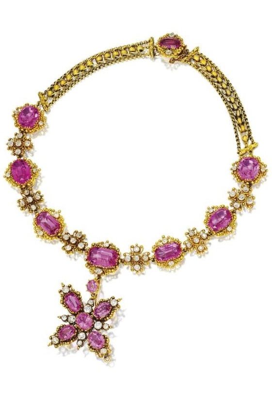 Gold, pink topaz and diamond pendant-brooch/necklace, circa 1830. Set with 8 eme...
