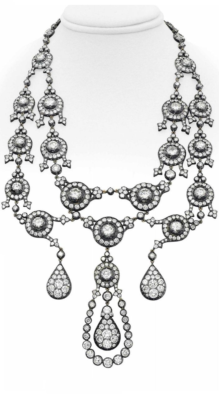 Necklace Collection : A DIAMOND NECKLACE. Designed as a necklace suspending a tw...
