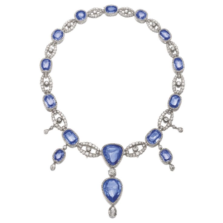 Sapphire, diamond, silver and gold necklace.