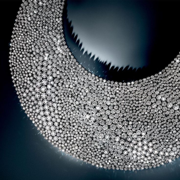 Three thousand diamonds softly ripple over the surface of this necklace, like wa...