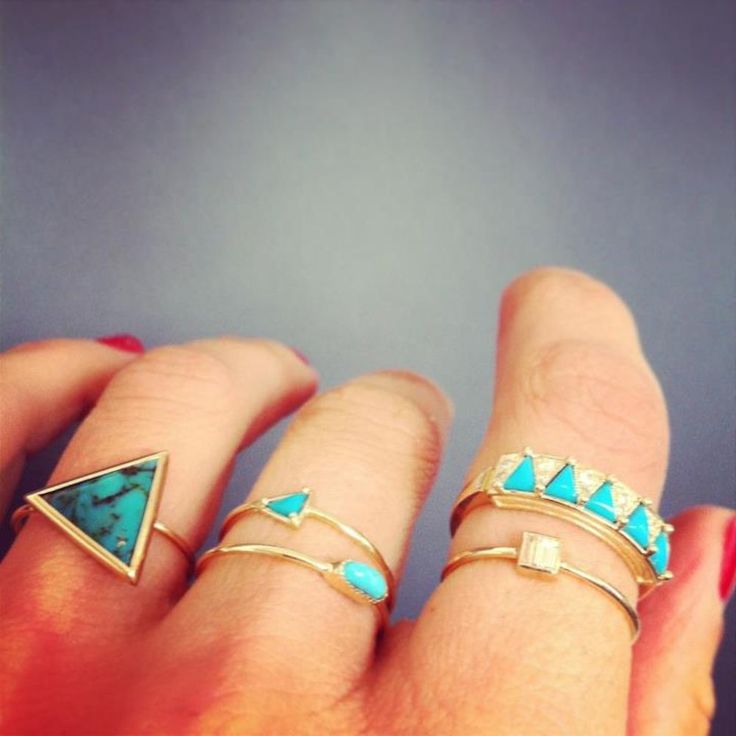 Stacked turquoise rings.