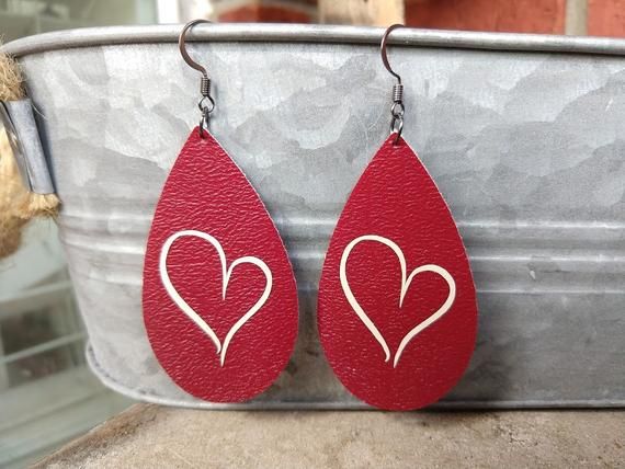 Celebrate Valentines Day with these festive heart earrings. Great for February, ...