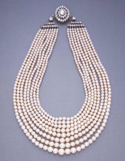 AN EIGHT-STRAND PEARL AND DIAM