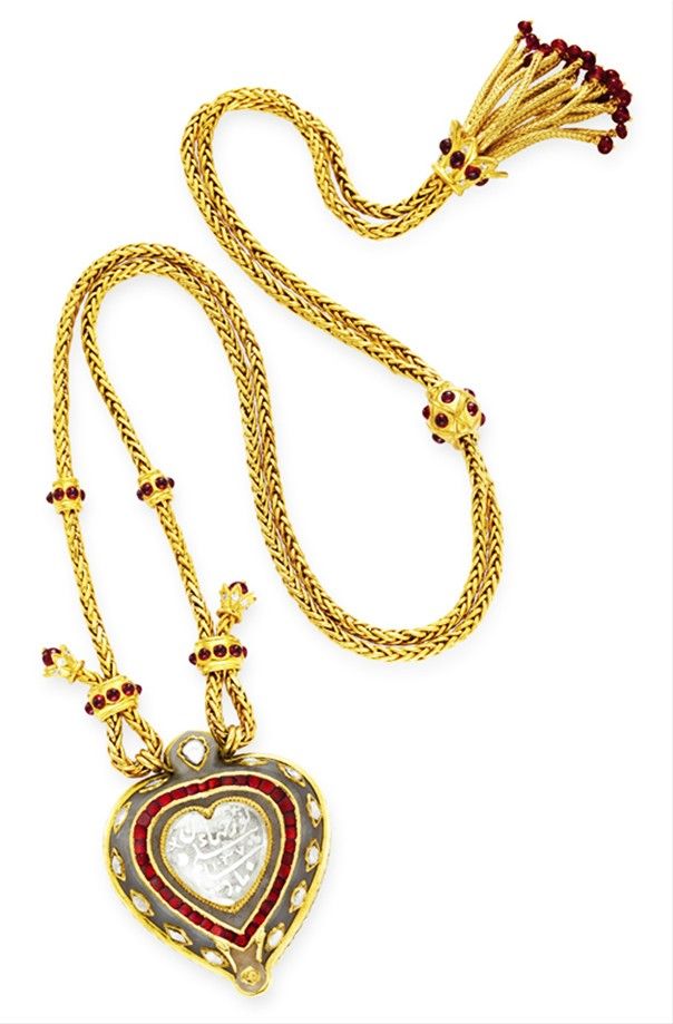 Elizabeth Taylor's heart-shaped Taj Mahal diamond by Cartier, on a ruby and ...
