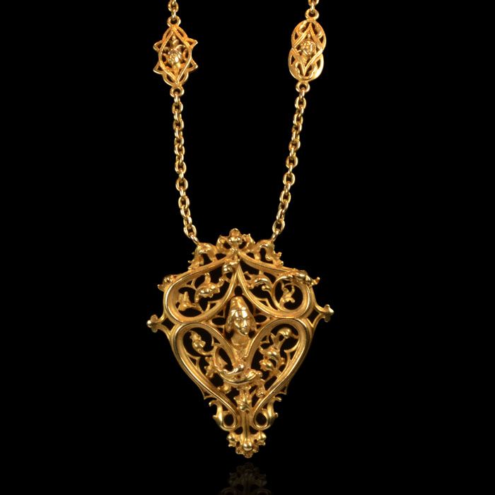 Rare pendent necklace in a Gothic Revival style designed as a chain of yellow go...