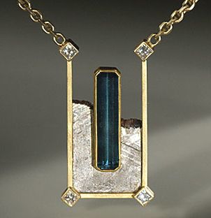 Tourmaline, diamonds and gold, set with a piece of meteorite.