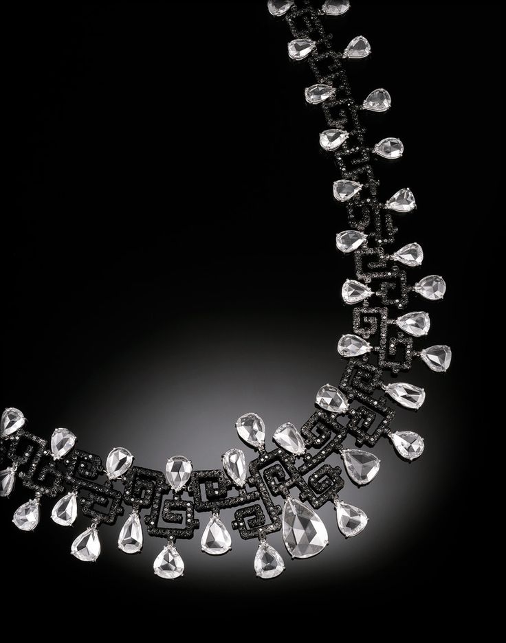 White and black diamond necklace by Carnet.