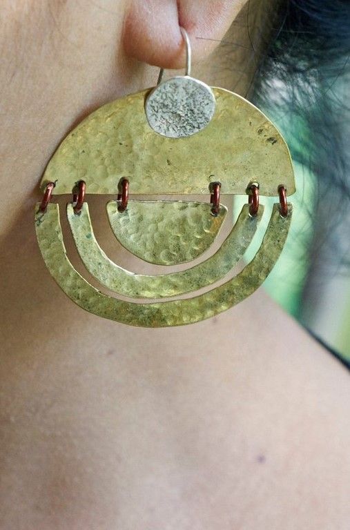 These golden full circle hoop earrings are lightweight. Wabi Sabi
