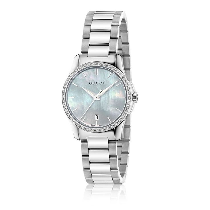 A shimmering mother of pearl dial is offset beautifully by the dazzling diamond ...