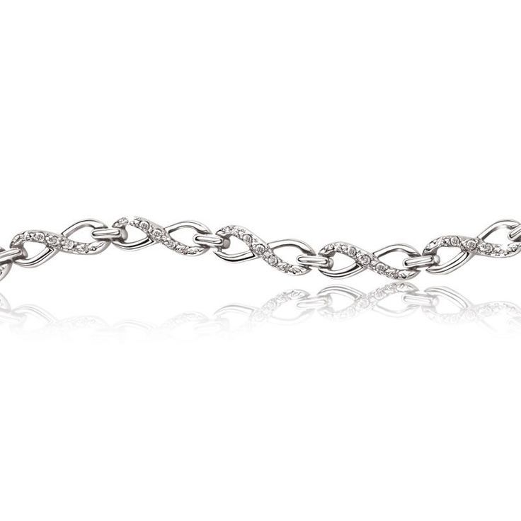 This gorgeous diamond infinity bracelet symbolizes a love that lives for now, fo...