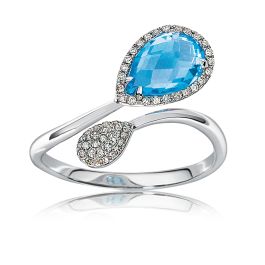 This striking pear-shaped blue topaz ring features 50 hand-set round brilliant d...