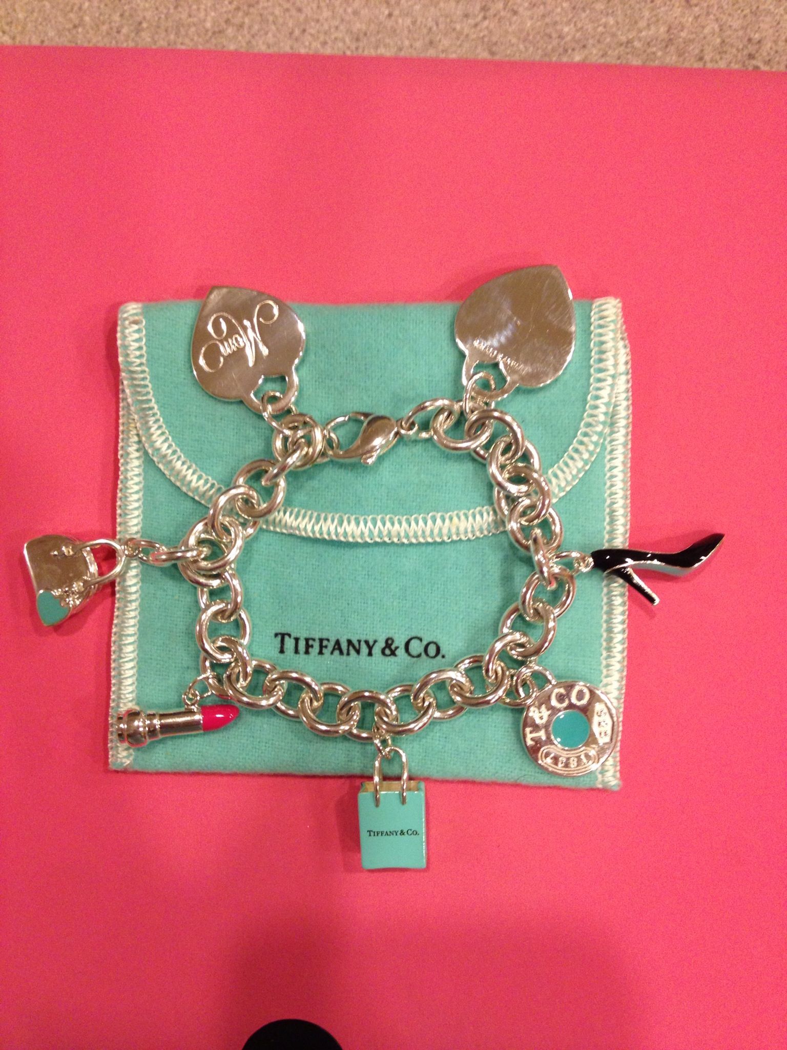 MY Tiffany's charm bracelet. (Charms were given to me by husband and children fo...